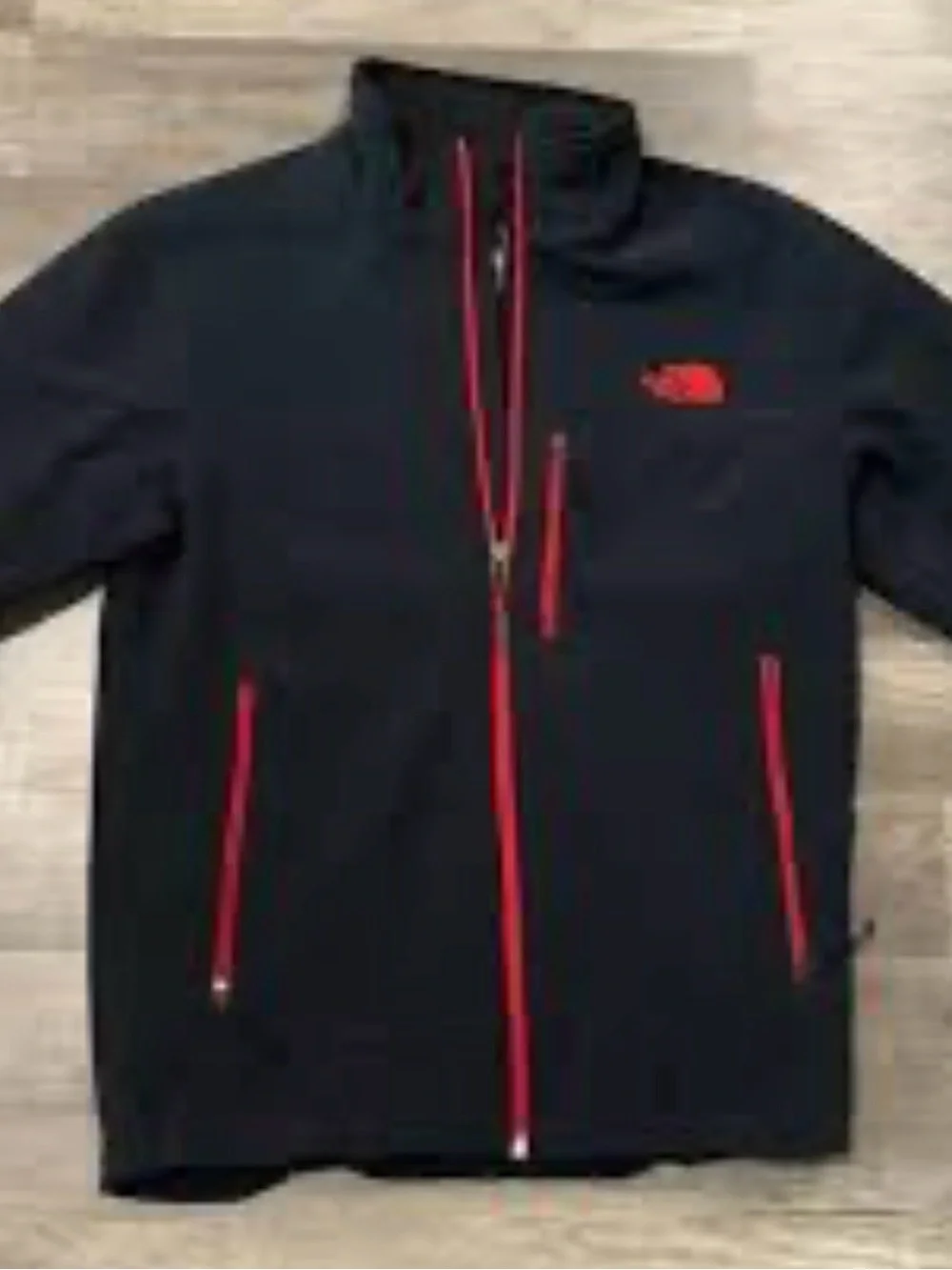 The North Face Men's Black Jacket with Red Accents